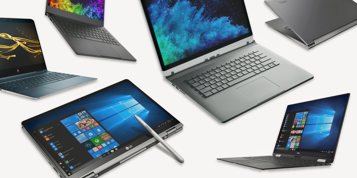 cầm laptop